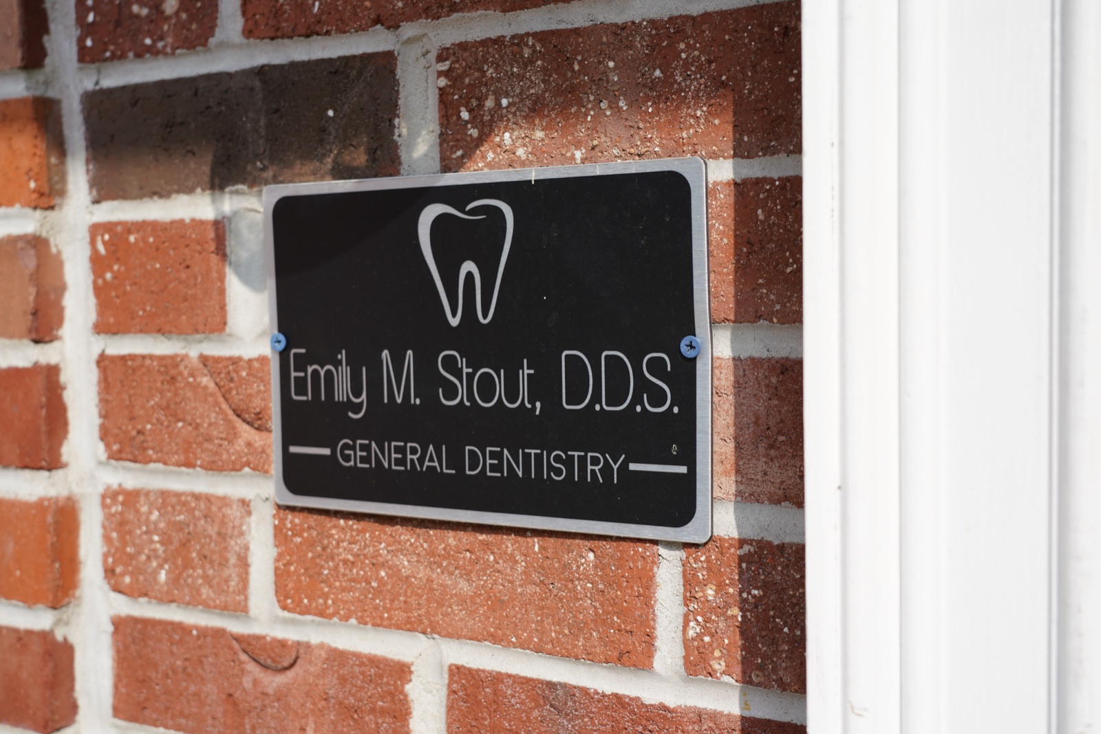 The Emily M. Stout, D.D.S. General Dentistry entrance plaque